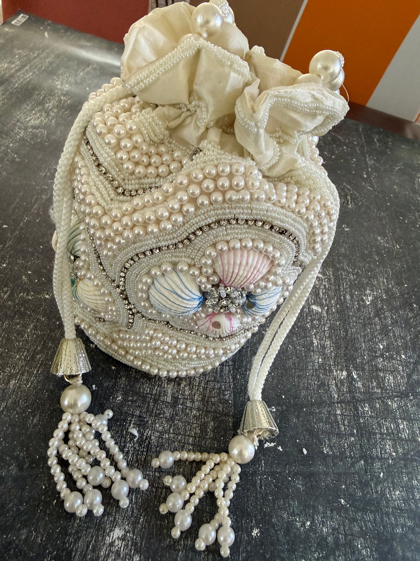 Heavy pearl work polti bags.