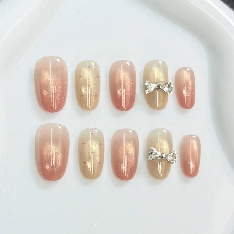 10Pcs Handmade Press on Nails with Butterfly and Rhinestone Accents Cat-Eye Design Nude and Pink Gradient Fair-Looking Manicure